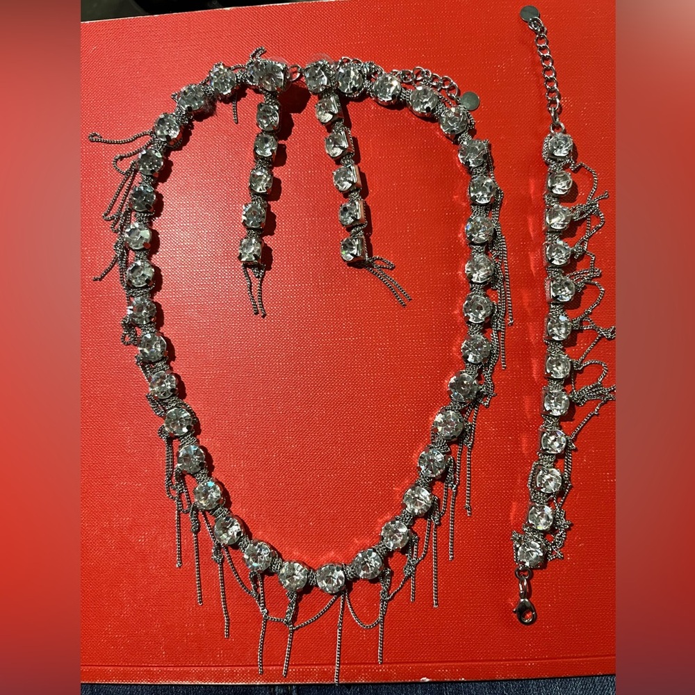 Bebe necklace, bracelet, earrings.